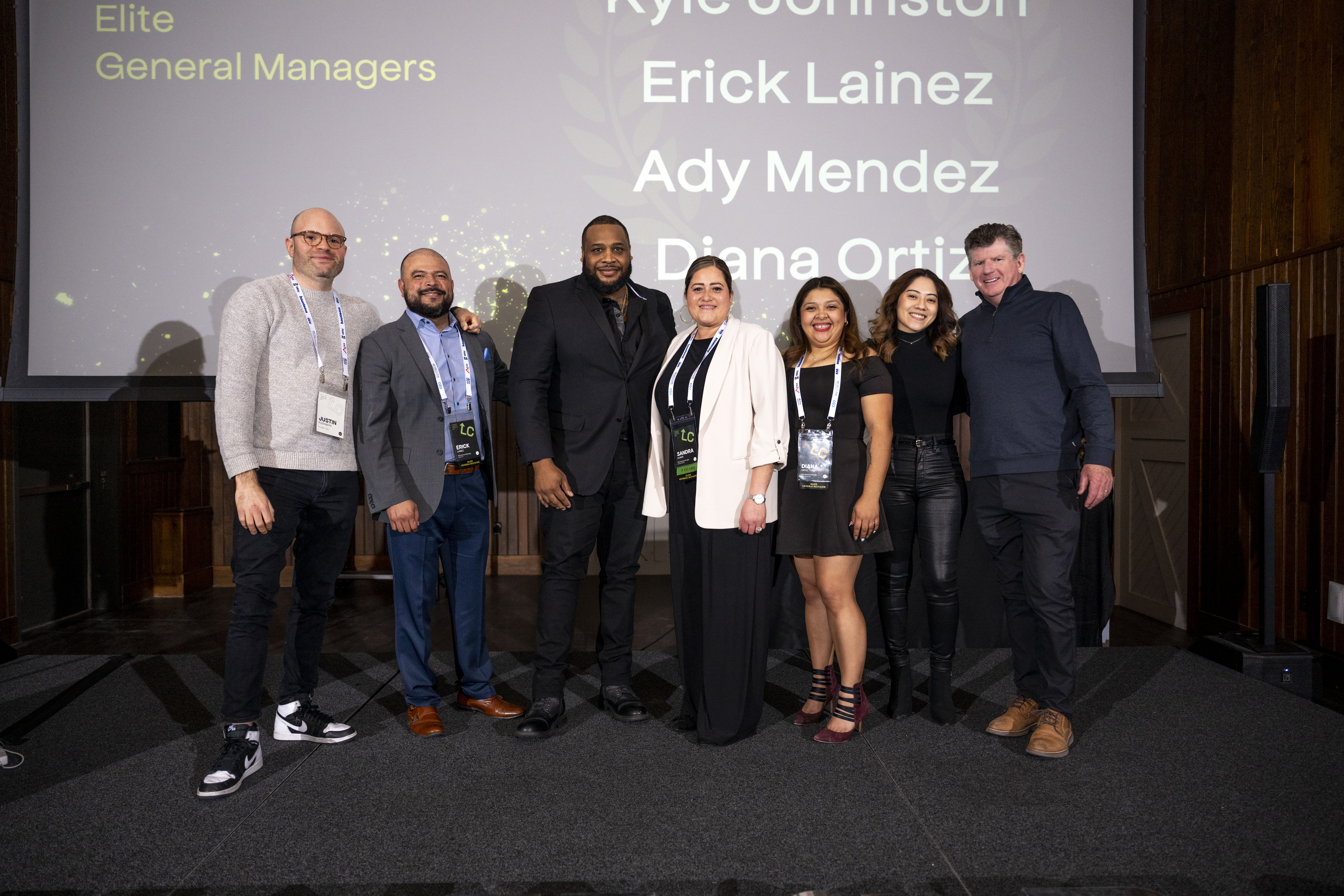 Conference attendees on stage